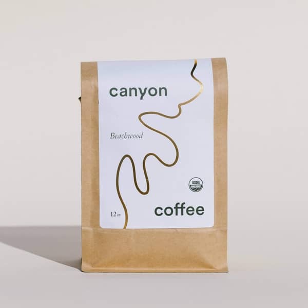 Canyon coffee Beachwood Blend 12 oz bag of whole bean coffee with a beautiful gold foil label