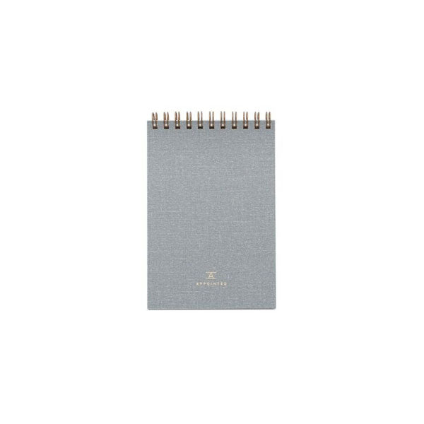 Dove gray Charcoal gray office notepad, "A/Appointed" printed on bottom, with gold/tan lettering. Gold loop binding.