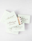 Green tea colored 2.22" x 1.375" x .46" personalized matchboxes with gold script. Approx. 22 white matches in each