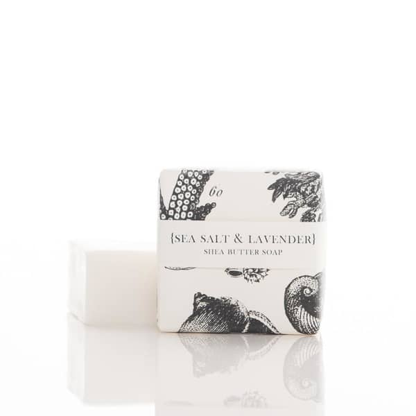 2 oz. Sea Salt &amp; Lavender scented Shea Butter Soap, in a white and black sea life graphic pattern wrapper. Soap is white colored, wrapped in a white/clear colored wrapper.